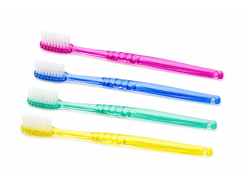 Cepillos de dientes desechables con pasta incorporada NEUBER en cuatro colores